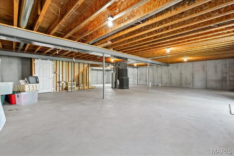 Large finishable lower level with rough out for additional bath and egress window — 253 Strayhorn Drive, St Peters, MO 63376