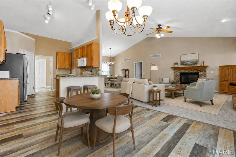 View of suggested staging in breakfast room and kitchen — 253 Strayhorn Drive, St Peters, MO 63376