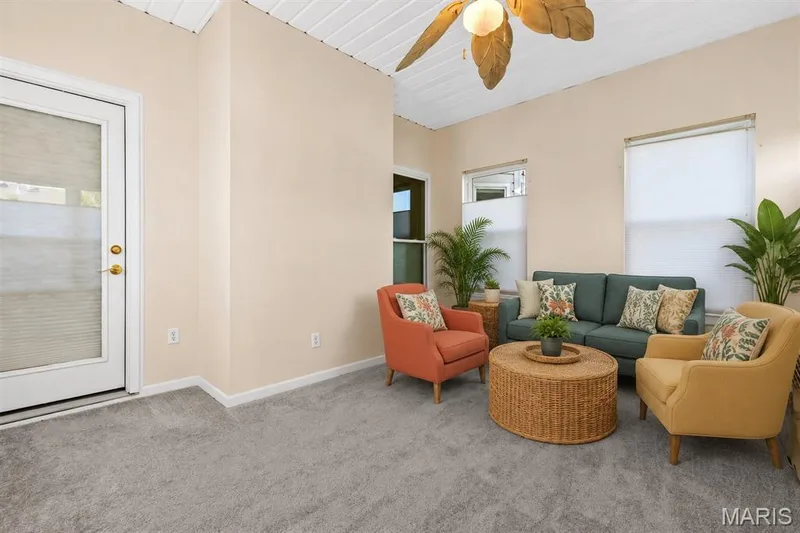 Another staging idea for Four Season room-view of door to kitchen — 253 Strayhorn Drive, St Peters, MO 63376