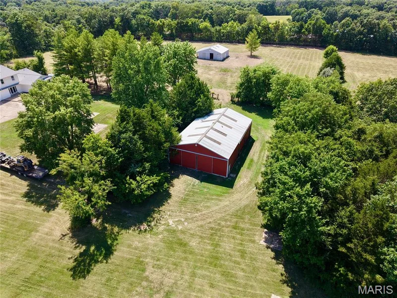 Expansive grounds featuring the large pole barn. — 33 Timber Ridge Drive, Marthasville, MO 63357