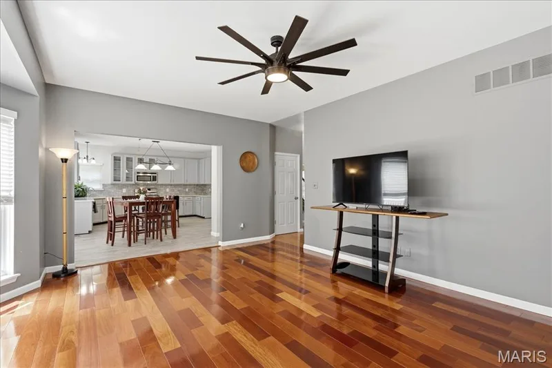 Opens to the kitchen and breakfast room. — 175 Beacon Point Lane, Wildwood, MO 63040