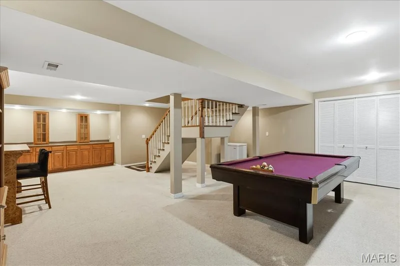 Partially finished lower level, with built-in counter/cabinets, for entertaining. — 175 Beacon Point Lane, Wildwood, MO 63040