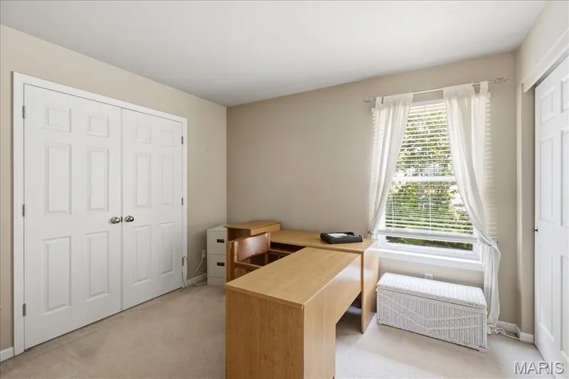 Second bedroom with French door to the primary bedroom. — 175 Beacon Point Lane, Wildwood, MO 63040
