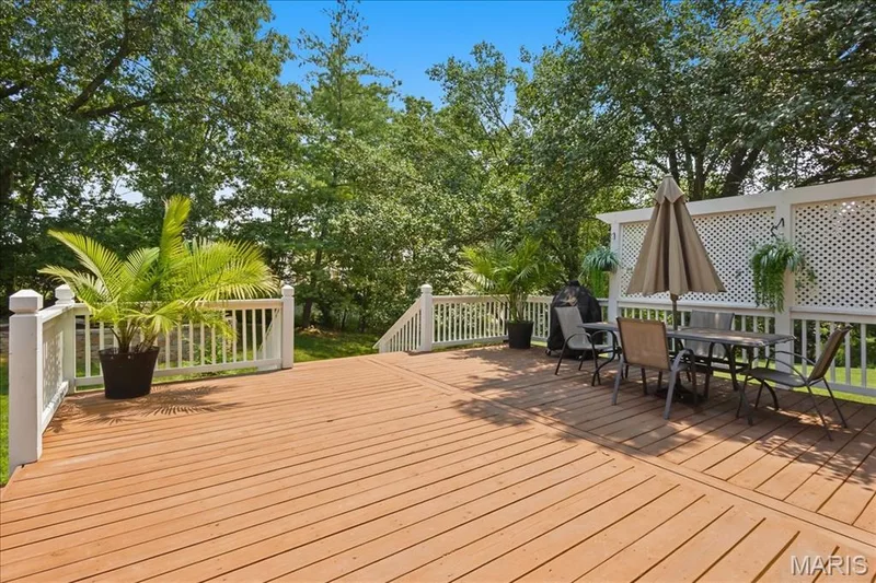 Spacious deck off of the breakfast room. — 175 Beacon Point Lane, Wildwood, MO 63040