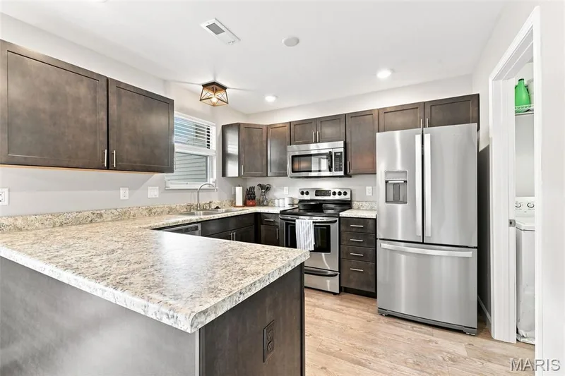 Updated Kitchen with Stainless Steel Appliances including the refrigerator. — 40 Trailside Court #2, St Peters, MO 63303
