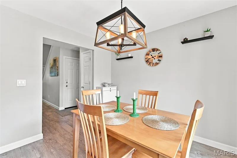 Gorgeous open kitchen and dining space with access to the deck. — 40 Trailside Court #2, St Peters, MO 63303