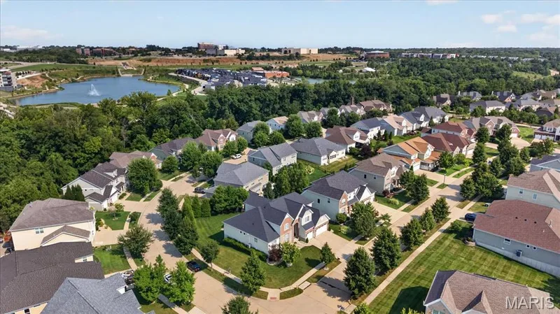 Aerial panorama showcasing a residential development with varied architectural styles — 302 Oak Stand Court, Chesterfield, MO 63005