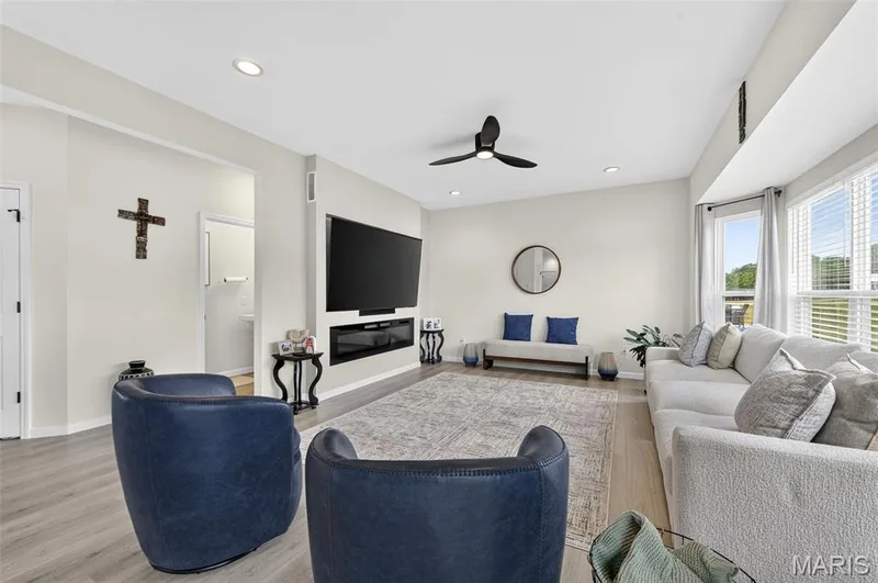 For those nights of entertainment or relaxation, enjoy this large space to unwind. Make it even cozier when utilizing the built-in electric fireplace! — 403 Yellow Rose Court, Wentzville, MO 63385