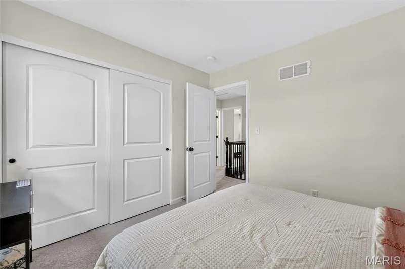Bedroom 3 located on the upper floor and a view overlooking the backyard. — 403 Yellow Rose Court, Wentzville, MO 63385