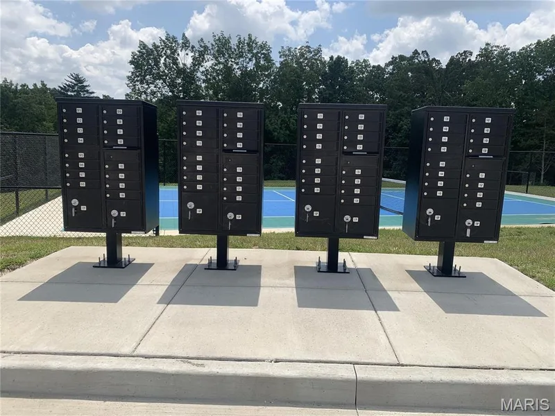 Mailbox Kiosk for the community is located near the pickleball court on White Orchid Ct, #153. — 403 Yellow Rose Court, Wentzville, MO 63385