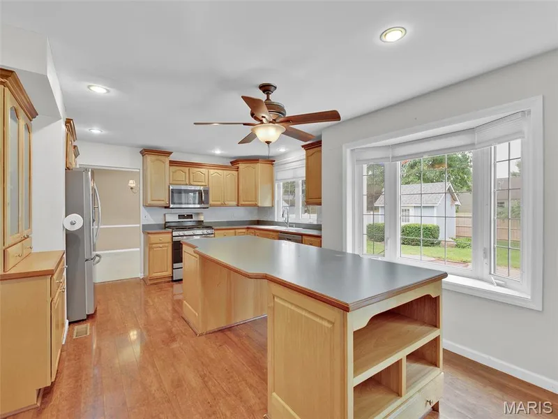 Huge island with storage and room for barstools. — 34 Shadow Creek Drive, St Peters, MO 63376