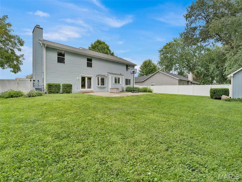 Look at this back yard- spacious, level, and fenced! — 34 Shadow Creek Drive, St Peters, MO 63376