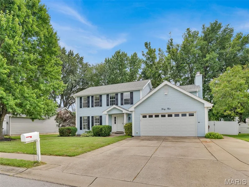 Note the extended driveway on the right side. — 34 Shadow Creek Drive, St Peters, MO 63376
