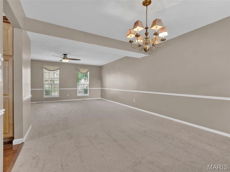 A different angle of the dining room toward living room. — 34 Shadow Creek Drive, St Peters, MO 63376