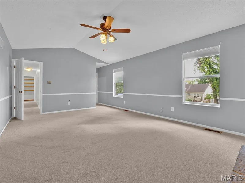 Another view of the spacious primary bedroom. — 34 Shadow Creek Drive, St Peters, MO 63376