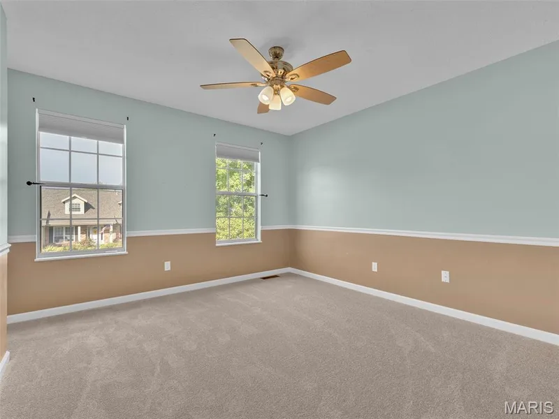 Bedroom 2 with brand new carpet and lighted ceiling fan. — 34 Shadow Creek Drive, St Peters, MO 63376