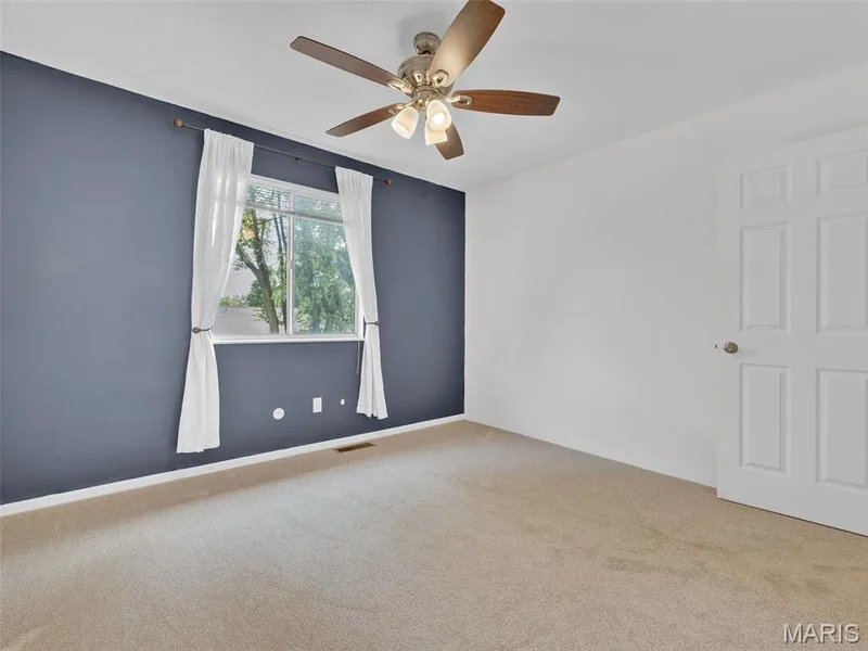 Bedroom 4 with brand new carpet and lighted ceiling fan. — 34 Shadow Creek Drive, St Peters, MO 63376