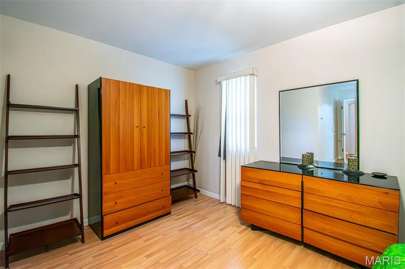 PRIMARY BEDROOM – With Walk-in & Additional Closet, and Ensuite Bathroom with Shower. Hardwood-style flooring throughout — 13261 COCHERO Drive, Chesterfield, MO 63141