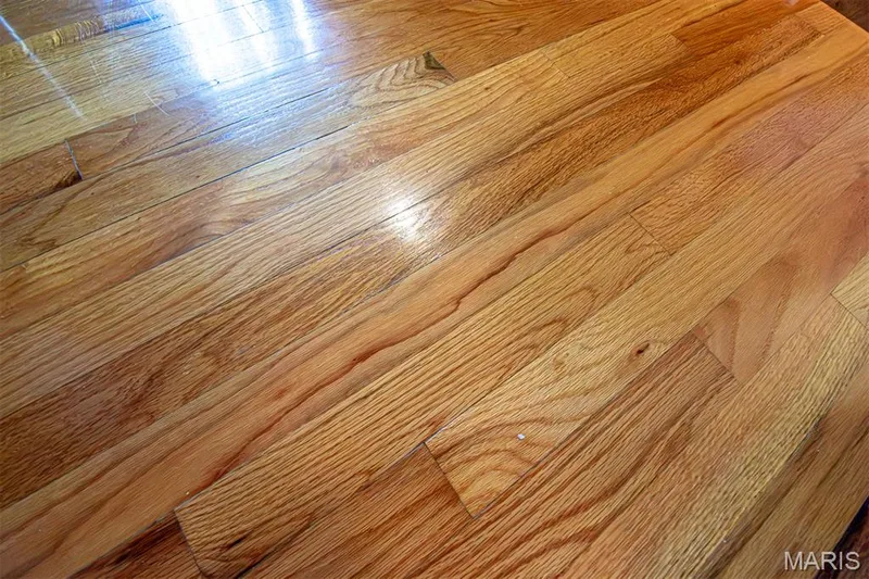 UPPER LEVEL - Hardwood flooring with a natural wood finish, visible grain patterns, and a glossy surface — 13261 COCHERO Drive, Chesterfield, MO 63141