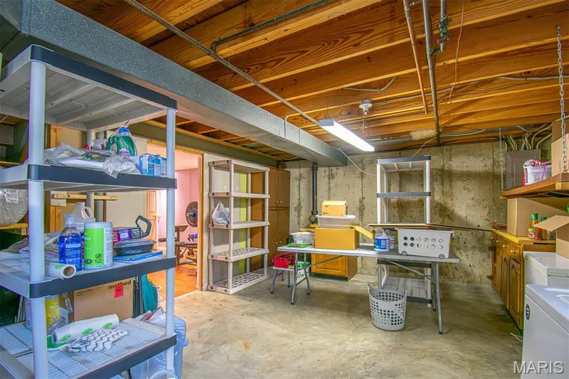 LOWER-LEVEL STORAGE AREA – Laundry/Utility/Workshop Hobby Area — 13261 COCHERO Drive, Chesterfield, MO 63141
