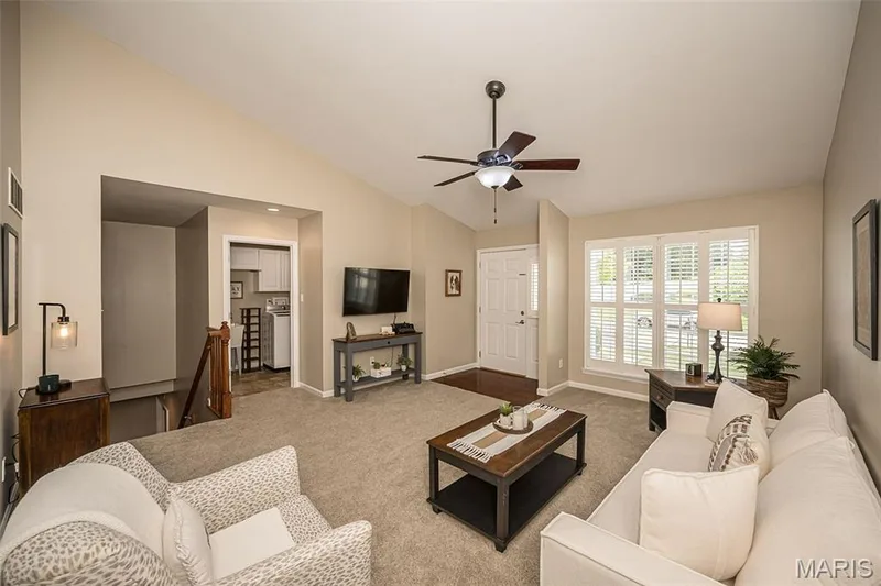 Walk in and be greeted by vaulted ceilings, lots of natural light, beautiful plantation shutters and a neutral pallet. — 249 Belmonte Circle, O'Fallon, MO 63368