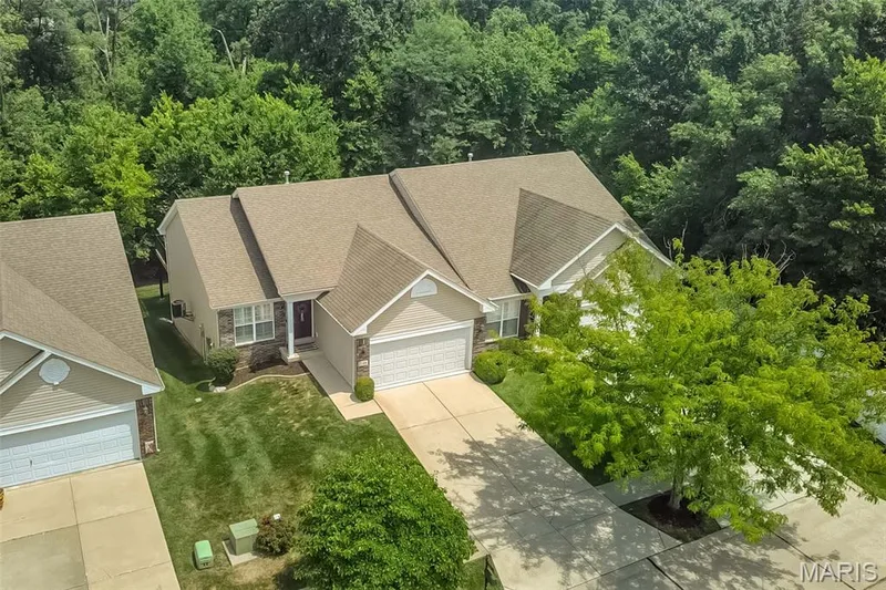 That thick tree line screams privacy! — 249 Belmonte Circle, O'Fallon, MO 63368