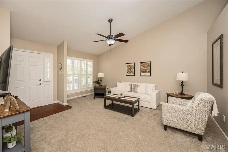 The plantation shutters and vaulted ceilings make this space! — 249 Belmonte Circle, O'Fallon, MO 63368