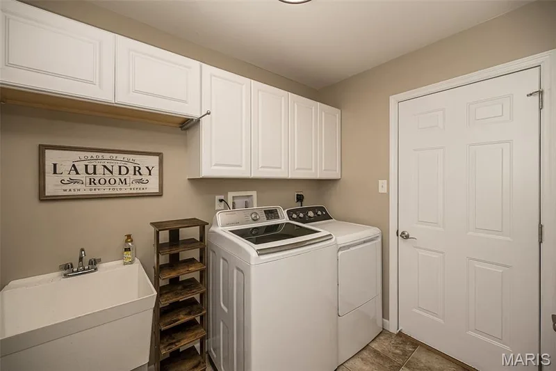 Main floor laundry, right off your attached 2 car garage. — 249 Belmonte Circle, O'Fallon, MO 63368
