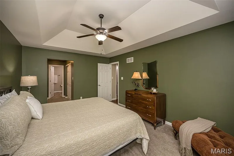 The cozy primary bedroom. — 249 Belmonte Circle, O'Fallon, MO 63368