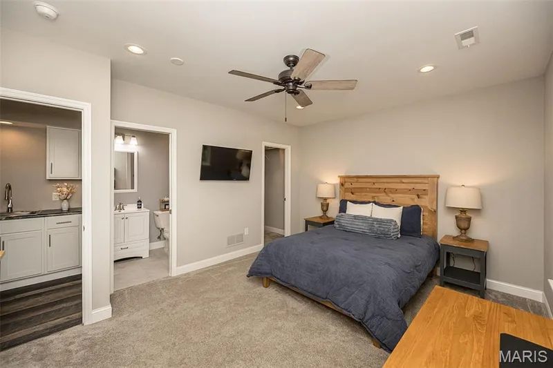 Another shot of the 3rd bedroom located in the lower level. You can see there is a walk in closet and access to the bathroom directly from the bedroom. — 249 Belmonte Circle, O'Fallon, MO 63368