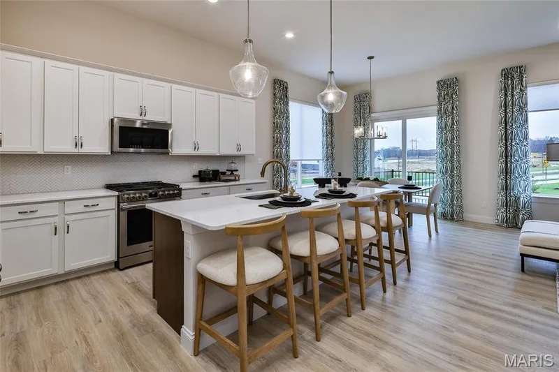 Kitchen area with a view of the Breakfast area — 401 Farmhouse Drive, O'Fallon, MO 63385