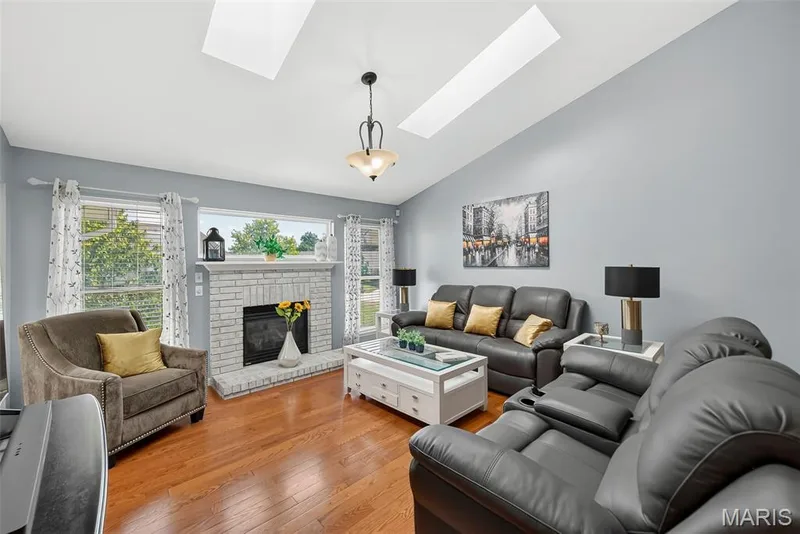 Vaulted great room with gas fireplace. — 306 Villa Tuscany Court #10B, O'Fallon, MO 63366