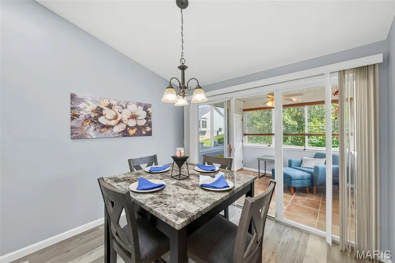 Breakfast room with view into 3 season room. — 306 Villa Tuscany Court #10B, O'Fallon, MO 63366