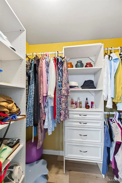 Primary closet with organizer system. — 306 Villa Tuscany Court #10B, O'Fallon, MO 63366