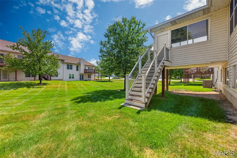 3 season room with stairs to yard. — 306 Villa Tuscany Court #10B, O'Fallon, MO 63366
