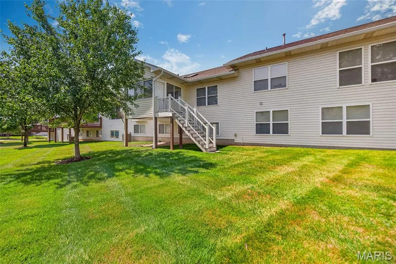 Rear view of exterior of home. — 306 Villa Tuscany Court #10B, O'Fallon, MO 63366