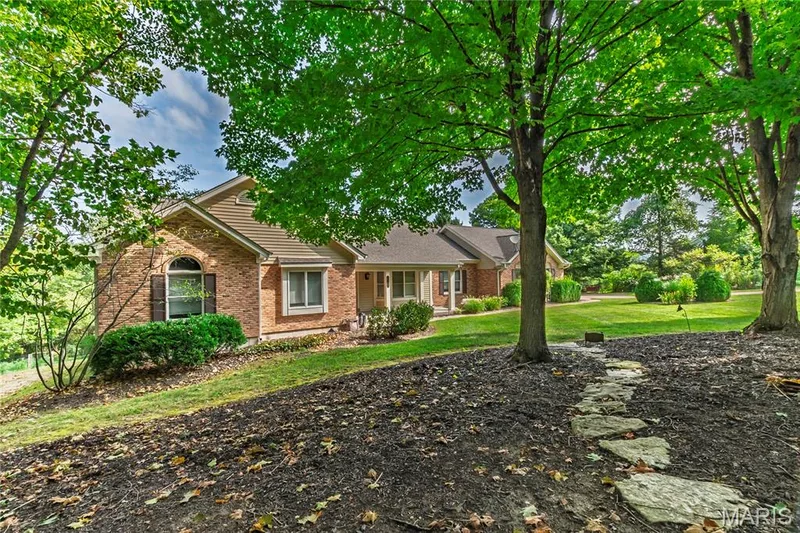 Stepping stones, leading through the front trees. — 17507 Summit View Place Cove, Glencoe, MO 63038