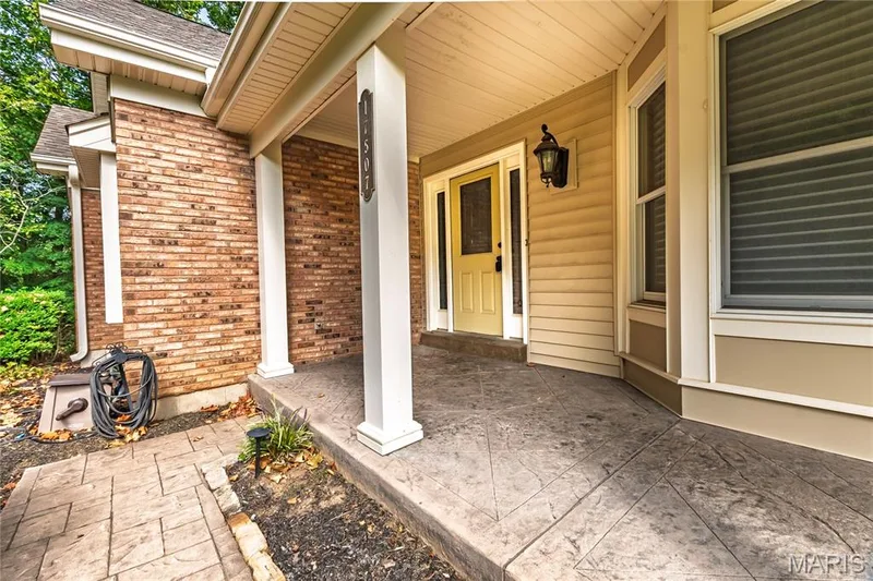 Stamped concrete front porch. — 17507 Summit View Place Cove, Glencoe, MO 63038