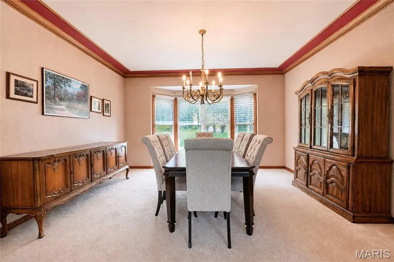 Nice and bright Formal Dining Room, featuring crown molding. — 17507 Summit View Place Cove, Glencoe, MO 63038