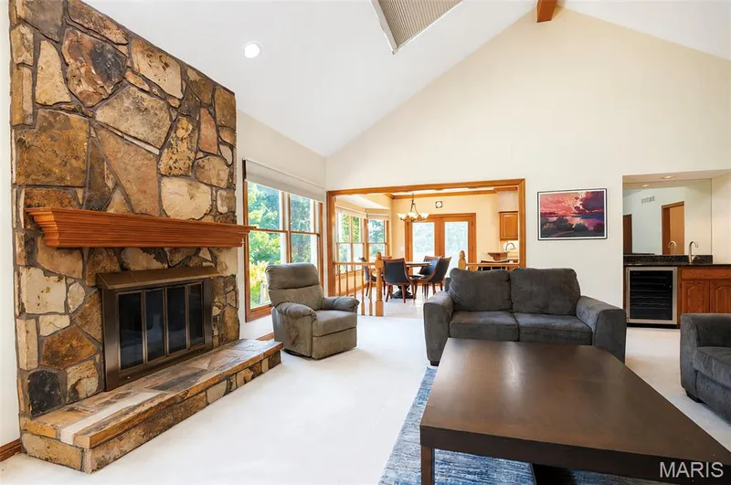 Gas Fireplace with a stone surround. — 17507 Summit View Place Cove, Glencoe, MO 63038