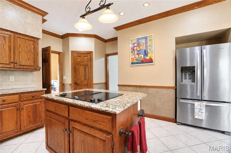 Electric cooktop on the island. — 17507 Summit View Place Cove, Glencoe, MO 63038