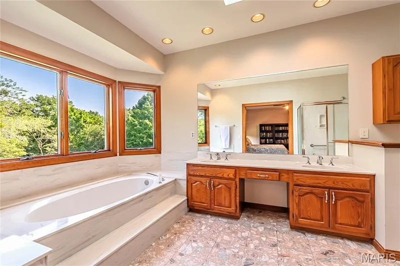 Master Bathroom large soaking tub and dual sinks. — 17507 Summit View Place Cove, Glencoe, MO 63038