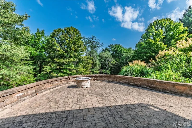 Newer Landscaping with a large stone Patio. — 17507 Summit View Place Cove, Glencoe, MO 63038