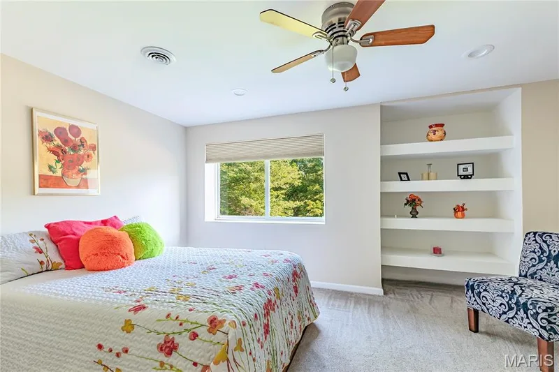 Built-in Bookcases and a Ceiling Fan in this Bedroom. — 17507 Summit View Place Cove, Glencoe, MO 63038