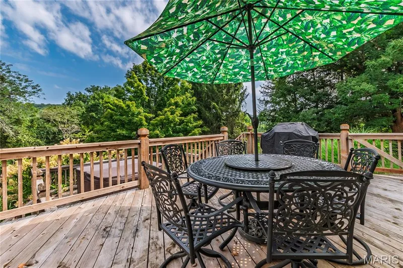 this is a 2 tier Deck with steps leading to a newer Spa — 17507 Summit View Place Cove, Glencoe, MO 63038