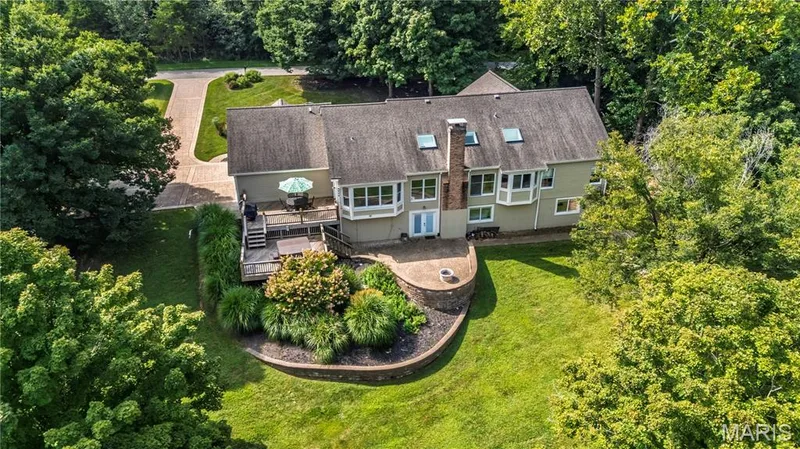Backyard with custom landscaping. — 17507 Summit View Place Cove, Glencoe, MO 63038