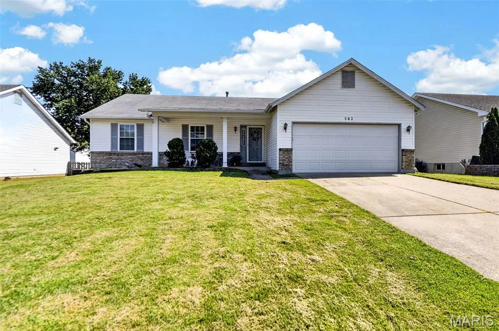 The one with a perfect locations and move-in ready!  Freshly painted interior, new carpeting and quite a few updates! — 582 Prentice Drive, St Peters, MO 63376