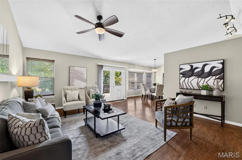 Spacious and open family room with vaulted ceilings, ceiling fan and freshly painted.  If a fireplace is something you desire....the home has a flue ready and waiting. — 582 Prentice Drive, St Peters, MO 63376