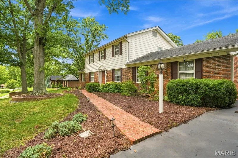 A brick sidewalk leads you to the entrance — 505 Richley Drive, Chesterfield, MO 63017
