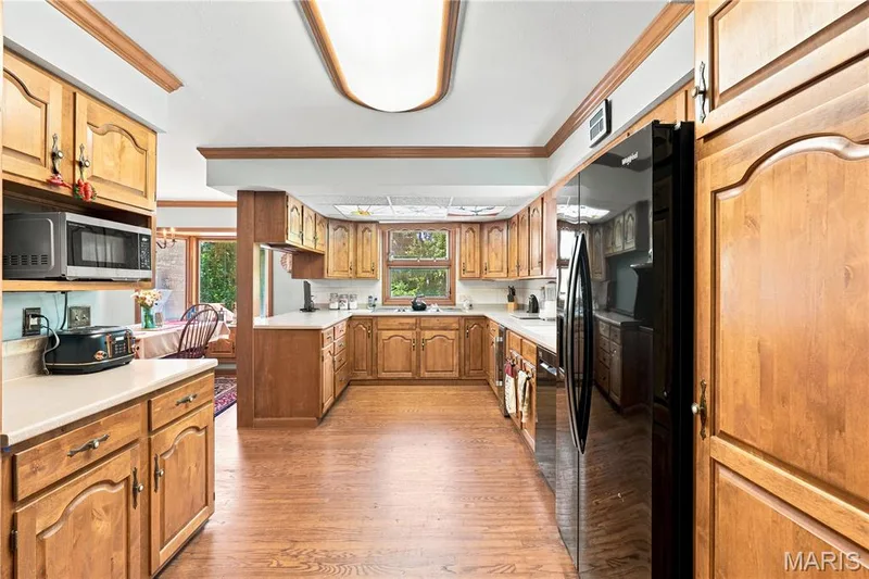 The kitchen offers plenty of prep and storage space — 505 Richley Drive, Chesterfield, MO 63017